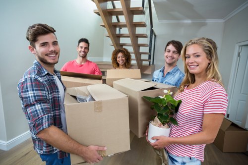 Local man and van moving furniture in Bow