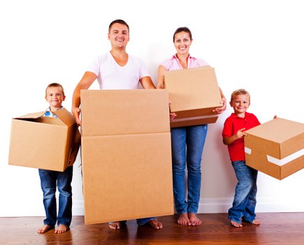 Removal team preparing a home move in Bow