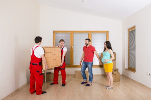 Careful loading of furniture for urgent removals in Bow