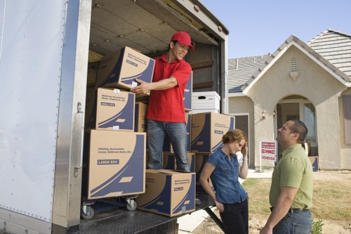 Loading furniture into a removal truck for a Bow relocation