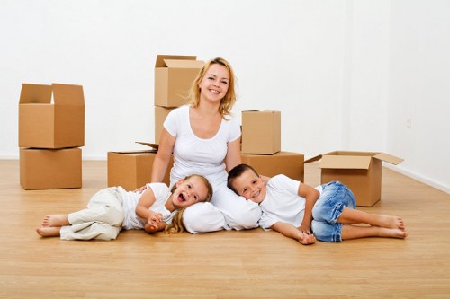 Packed boxes and business equipment ready for transport during a Bow move